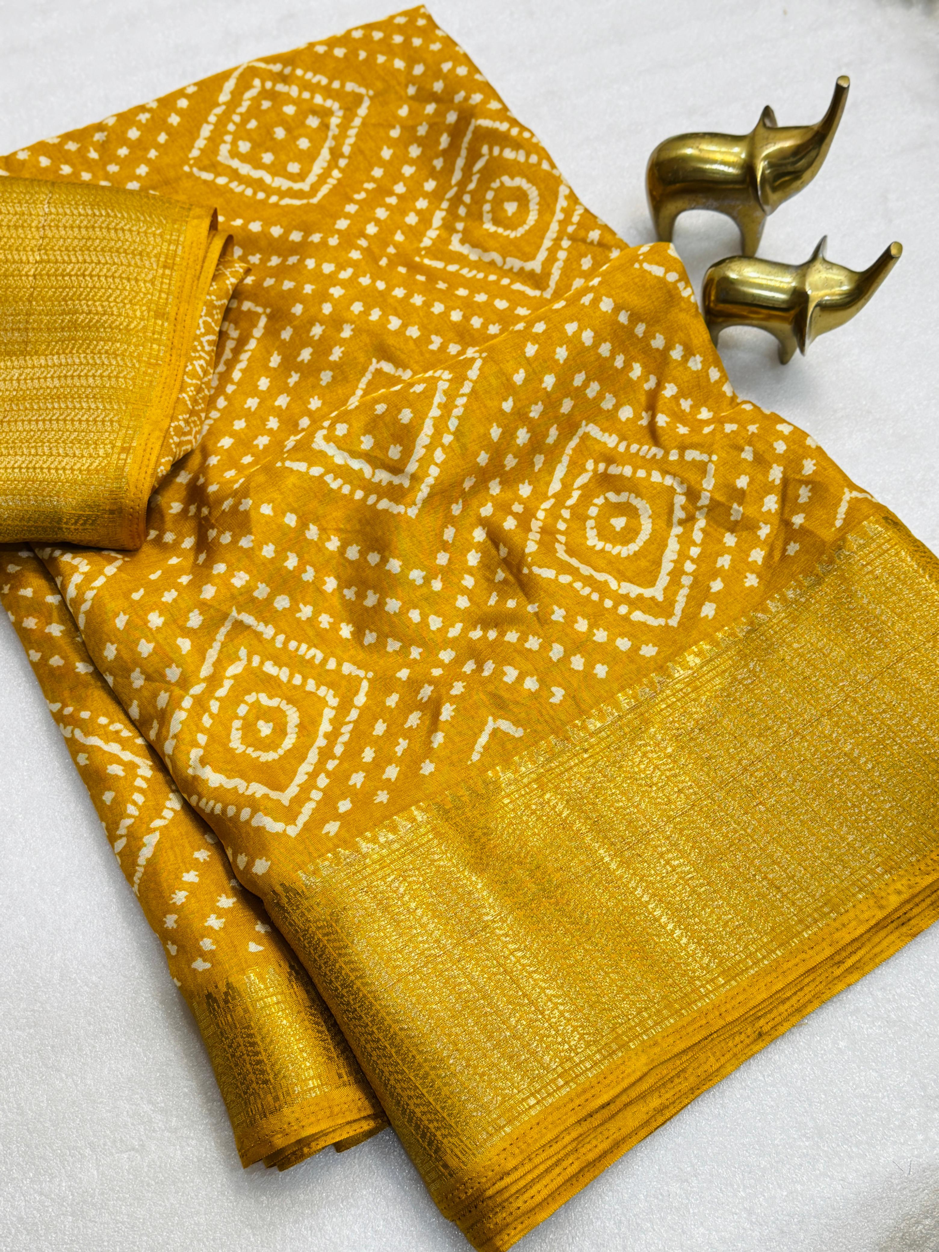Beautiful Dola  silk sarees   Bandhani print along with zari  border