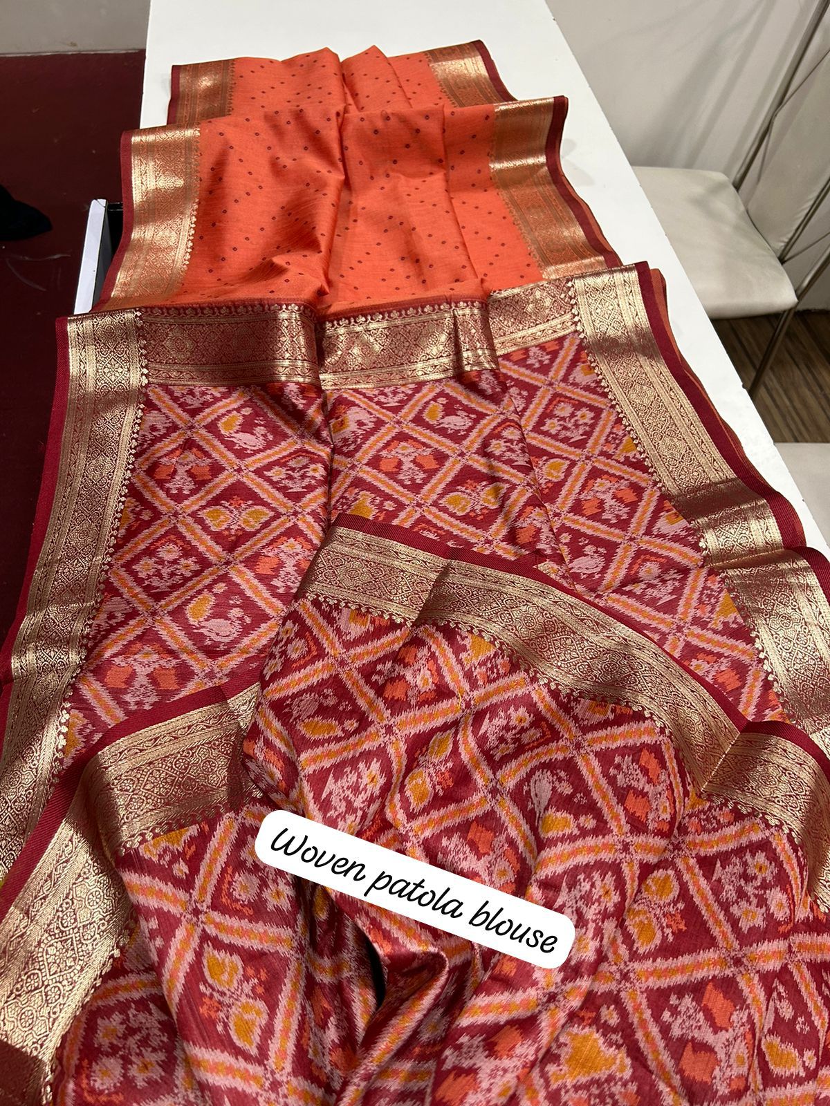 This pure silk feel fabric creates a beautiful combination of bandhani and Patola. Its Patola blouse adds to the beauty of this product. 